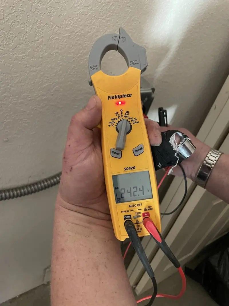 Voltage testing with clamp meter during Aluminum Wiring Replacement in Castle Rock